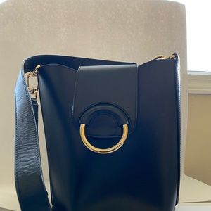 All leather bucket bag from Banana Republic, black and gold.